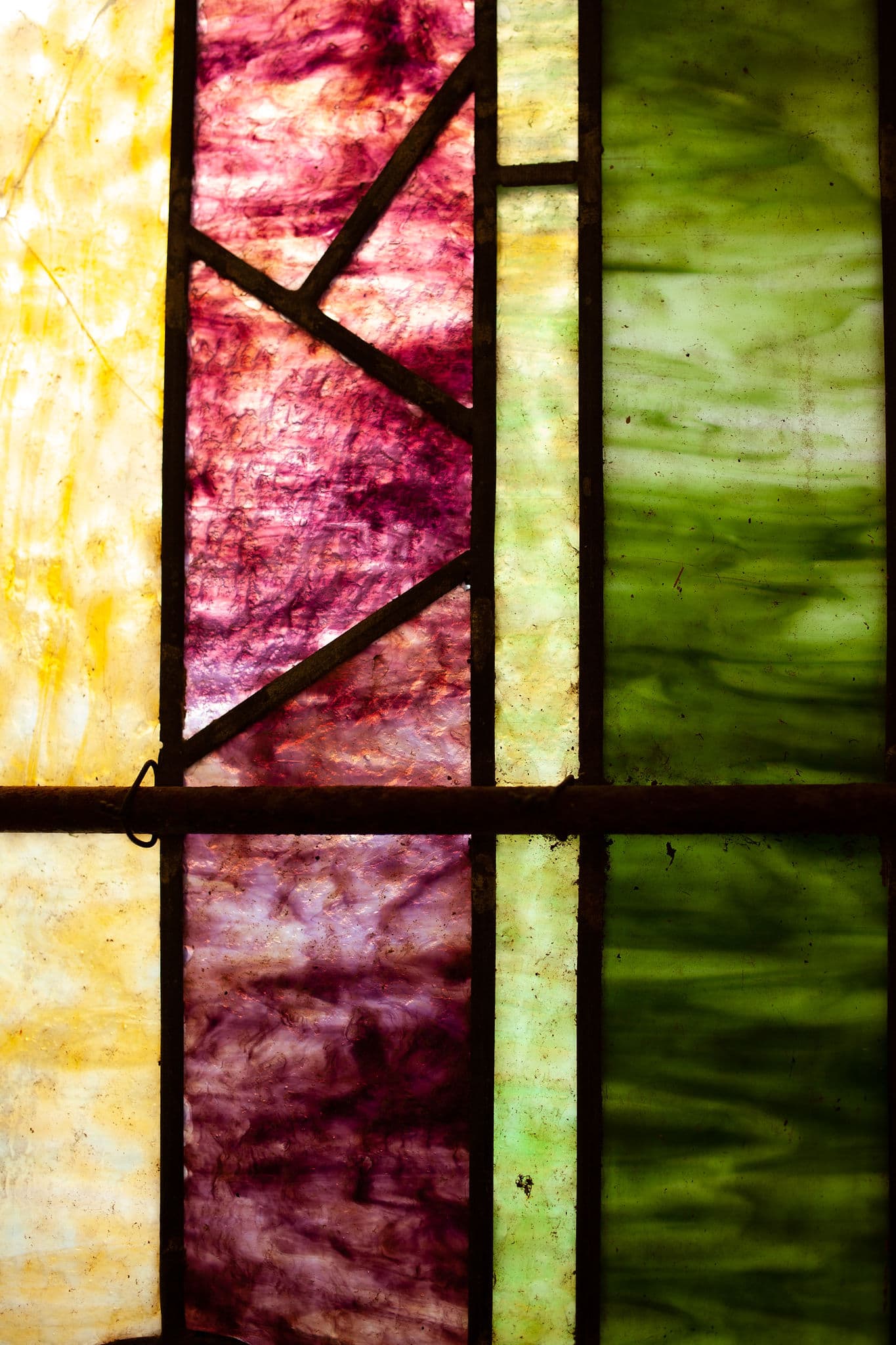 Stanined glass from Heritage Church with the a red filter.